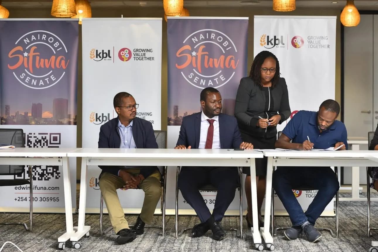 Sen. Edwin Sifuna at a signing with KBL under Sifuna Senate banners.